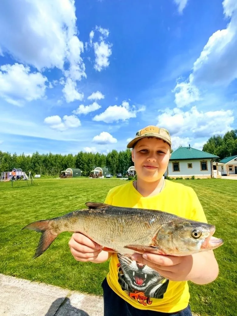 Юный гость с уловом